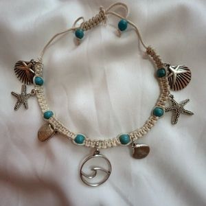 Turquoise beads in hemp w/ seashells charms.  Adjustable for bracelet or anklet